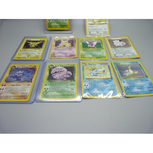 896 - Ten holographic Pokemon cards, one graded 5