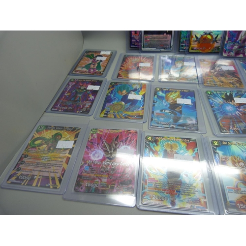 901 - Various holographic Dragonball Z trading cards in protective sleeves