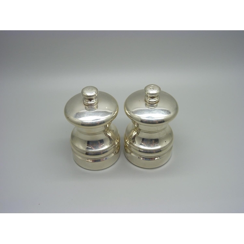 916 - A pair of silver pepper grinders, gross weight 259g