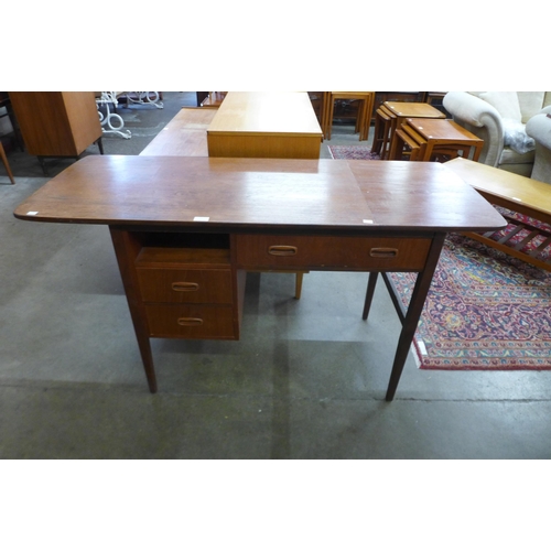 11 - A Jentique teak metamorphic drop leaf desk