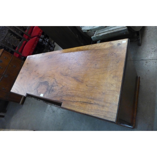 148 - A Victorian walnut breakfront desk