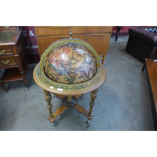 27 - A terrestrial globe cocktail cabinet/trolley