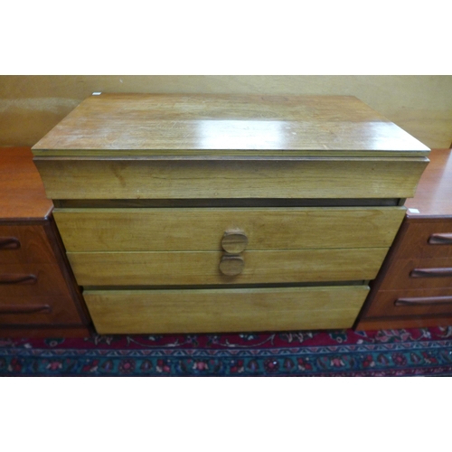 35 - A teak chest of drawers