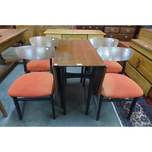 36 - A Portwood Ltd. tola wood and black drop leaf table and four chairs