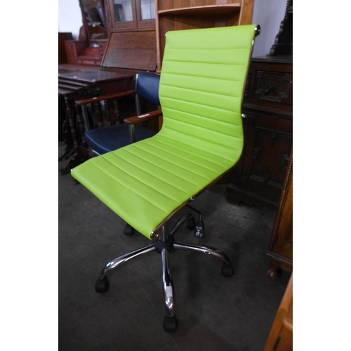 52 - An Eames style chrome and lime green leather revolving desk chair