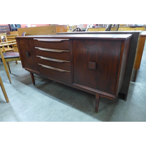 55 - A teak sideboard