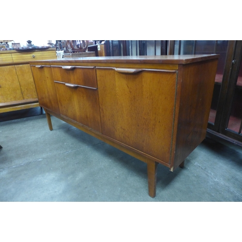 57 - A teak sideboard