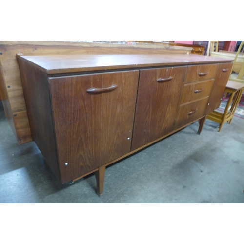 59 - A teak sideboard