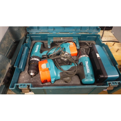 2027 - Bosch GST120BE Pro jigsaw in case and pair of Makita cordless drills with batteries and charger plus... 