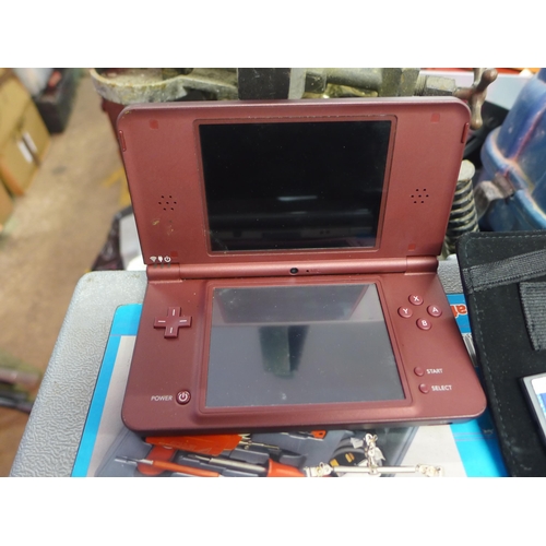 2224 - 2 Nintendo DS XL consoles with chargers, case and qty. of games - both W