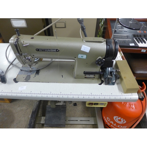 2334 - Mitsubishi industrial sewing machine mounted on work table