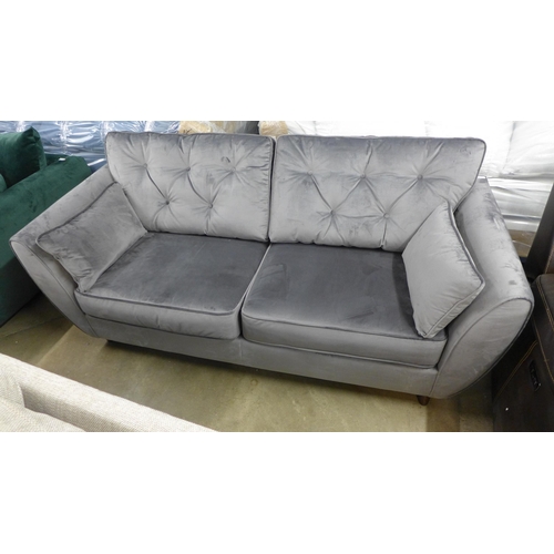 1402 - A Hoxton grey velvet three seater sofa