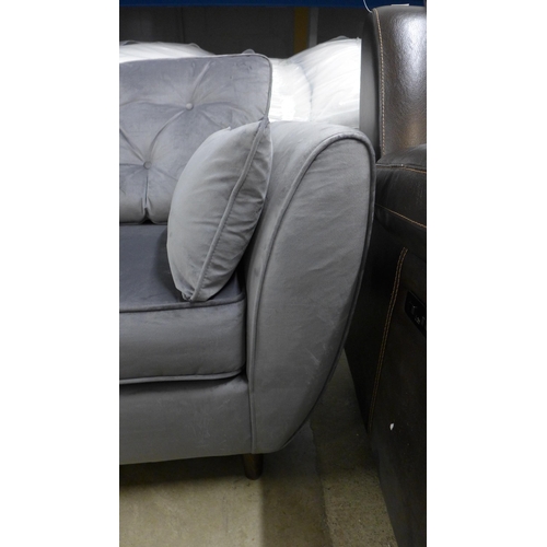 1402 - A Hoxton grey velvet three seater sofa