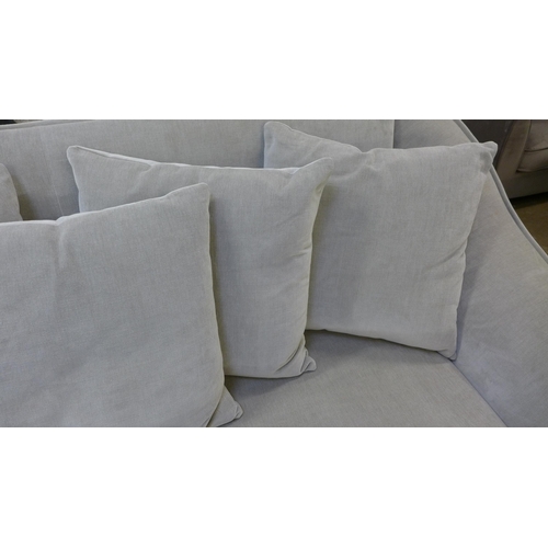 1414 - A grey velvet Danetti upholstered high back four seater sofa