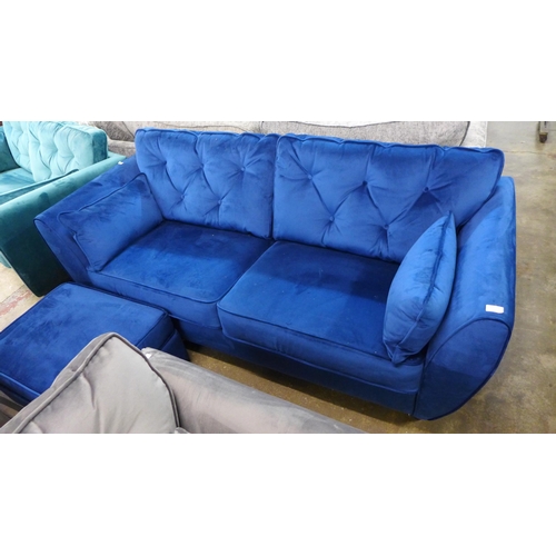 1423 - A Hoxton blue velvet three seater sofa