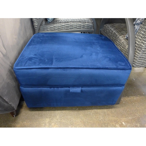 1423 - A Hoxton blue velvet three seater sofa