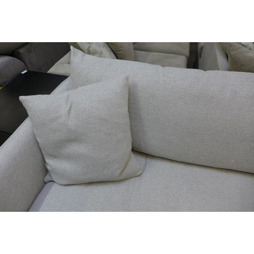 1450 - A dove grey upholstered four seater sofa