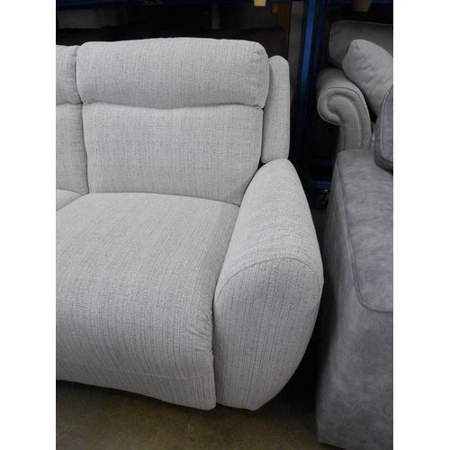 1461 - A champagne and grey fleck high back three seater sofa