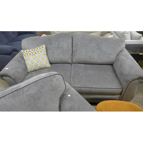 1475 - A grey velvet upholstered two seater sofa