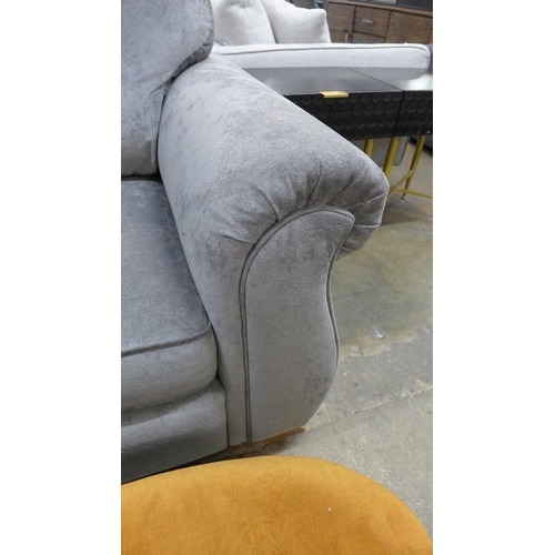 1475 - A grey velvet upholstered two seater sofa