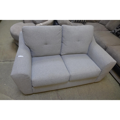 1485 - A grey textured weave small two seater sofa