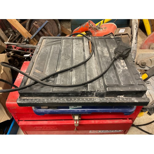 2010 - Red tool box with Vitrex tile cutter