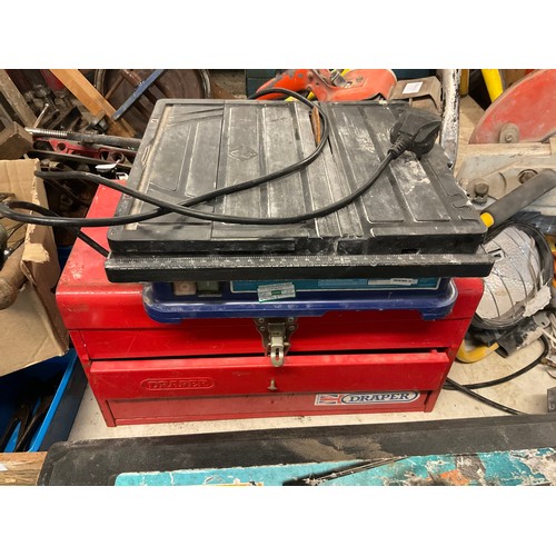 2010 - Red tool box with Vitrex tile cutter