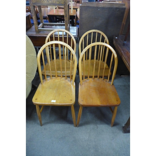 599 - A set of four beech stick-back kitchen chairs