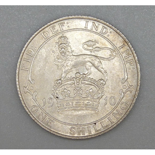 107 - A 1910 one shilling coin, EF