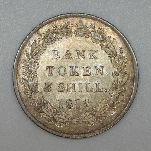 109 - A George III 1812 three shillings Bank Token