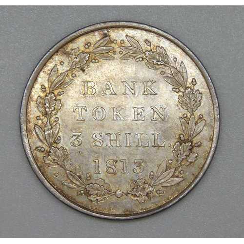 111 - A George III 1813 three shillings Bank Token