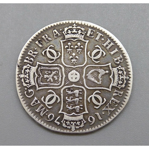 223 - A Charles II 1676 half crown