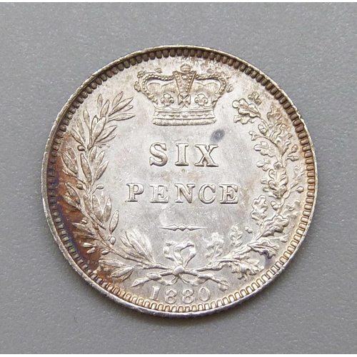 225 - An 1880 sixpence coin, EF