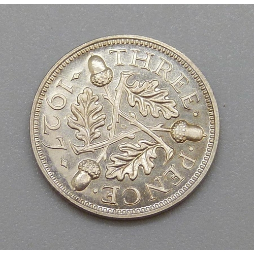 304 - A George V 1927 3d coin, uncirculated