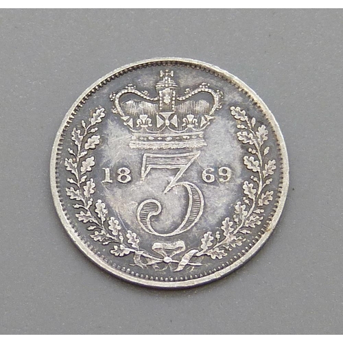 307 - An 1869 3d coin