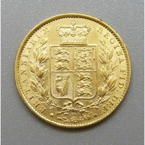 329 - A Victorian 1864 full sovereign, die 80