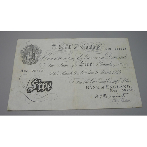 386 - A 1945 white £5 note, Peppiatt cashier