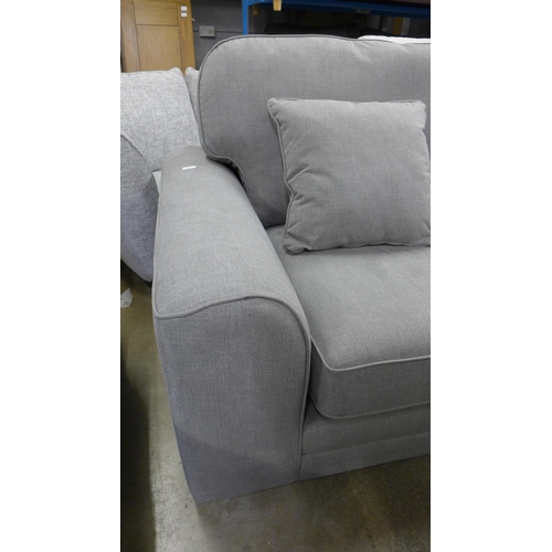 1418 - A grey fabric three seater sofa