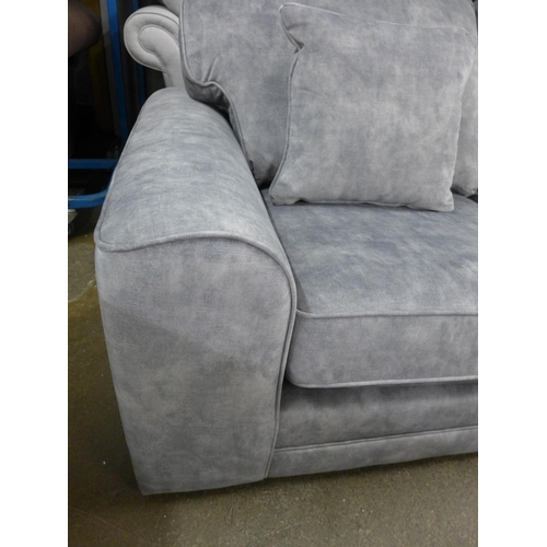 1419 - A grey shark skin effect three seater sofa