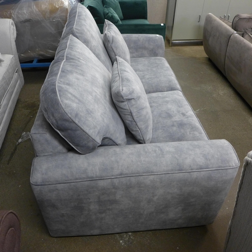 1419 - A grey shark skin effect three seater sofa