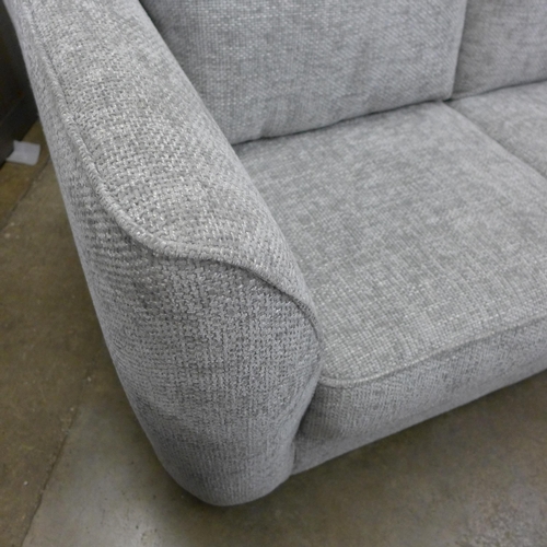 1453 - A grey silver fleck two seater sofa