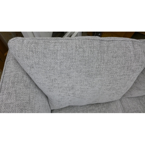 1453 - A grey silver fleck two seater sofa