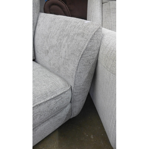 1453 - A grey silver fleck two seater sofa