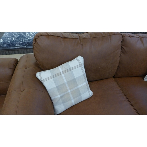 1476 - A faux leather upholstered county style three seater sofa with patterned scatter cushions