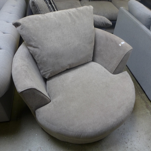 1365 - A sandstone upholstered swivel love seat