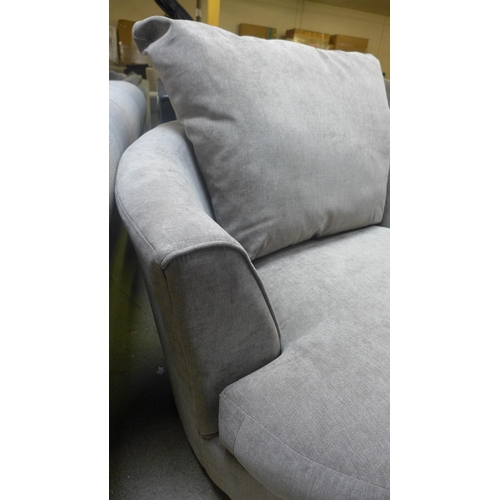 1365 - A sandstone upholstered swivel love seat