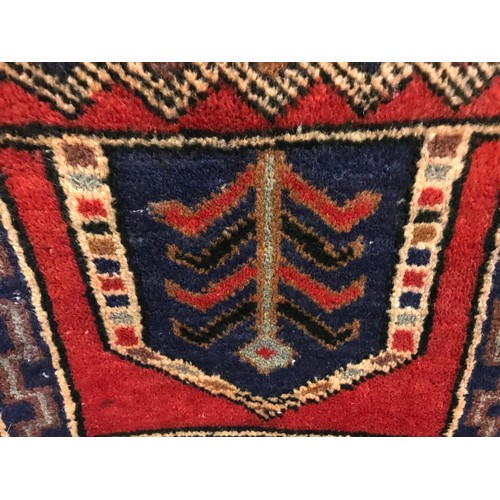 1395 - An Old Baluchi rug, 141cm x 87cm