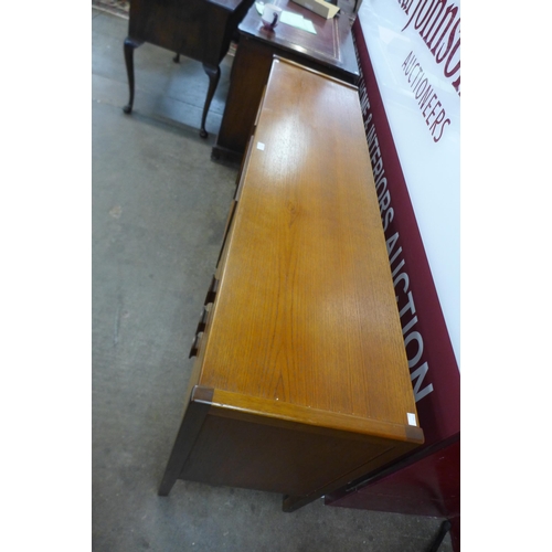 10 - A teak sideboard