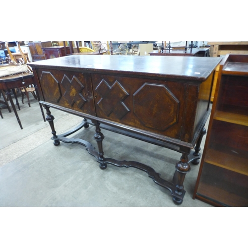 142 - A Jacobean Revival geometric inlaid walnut dresser