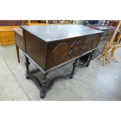 142 - A Jacobean Revival geometric inlaid walnut dresser